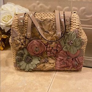 Valentino Hand crafted Leather Flower details on a Woven Top Handle Bag
